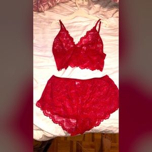Lacy red lingerie set. Bra and panties. Never worn